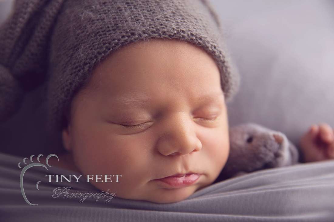 Tiny Feet Photography newborn baby close up shot of baby features